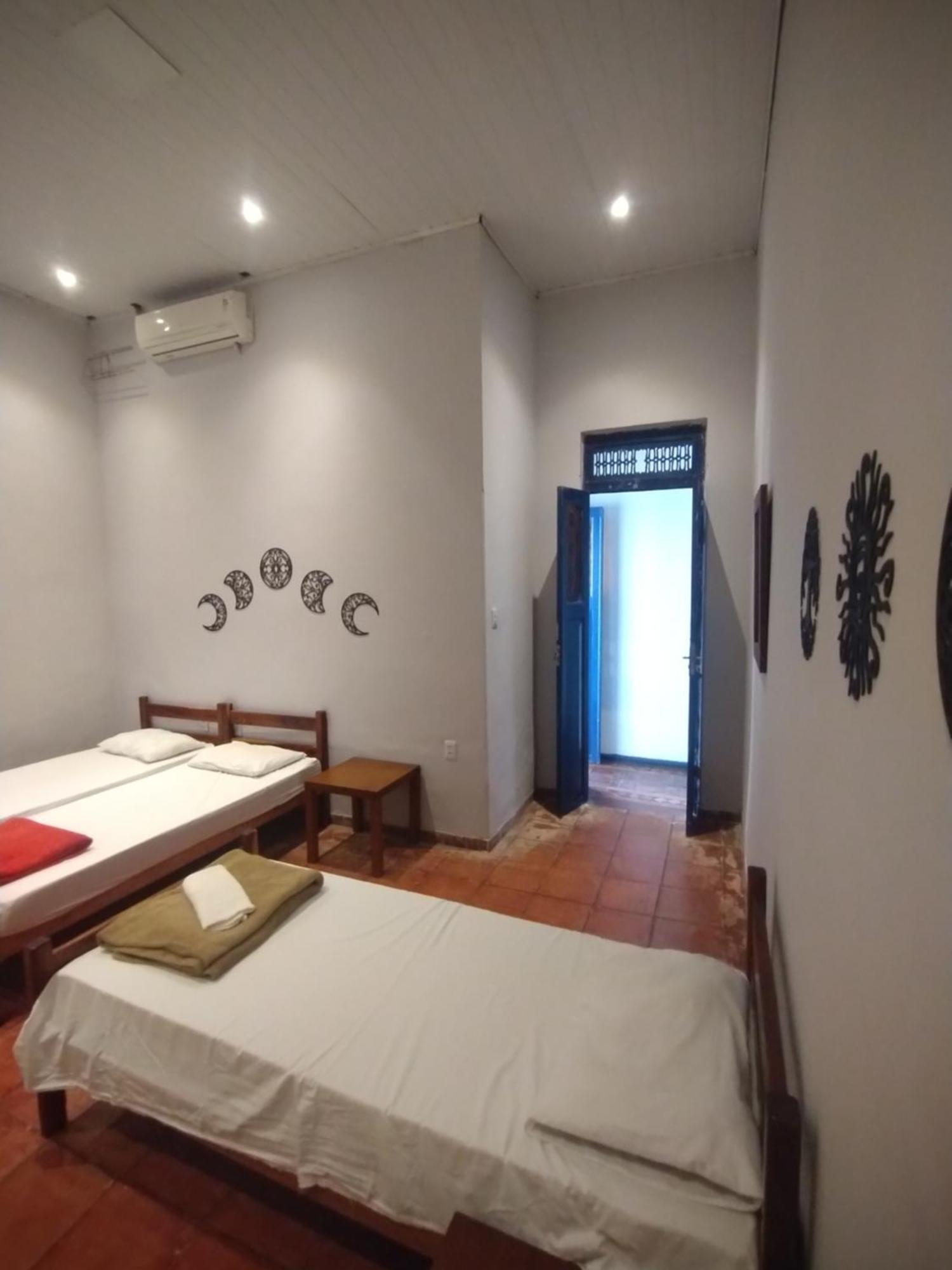 Quarto Triplo com Banheiro Privativo