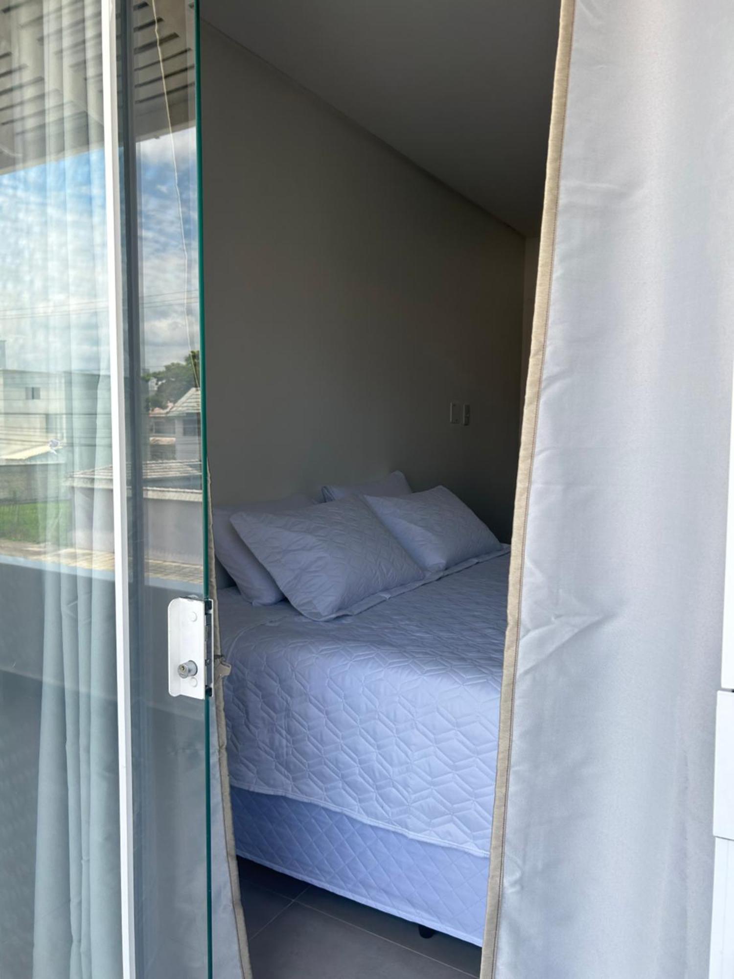 Quarto Quádruplo com Varanda
