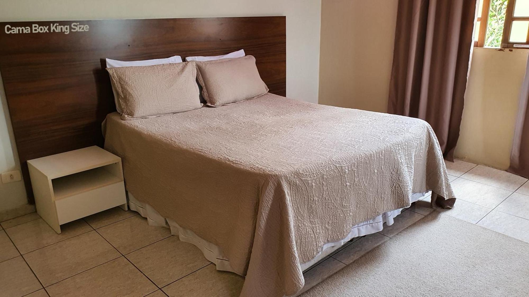 Quarto Quádruplo Premium