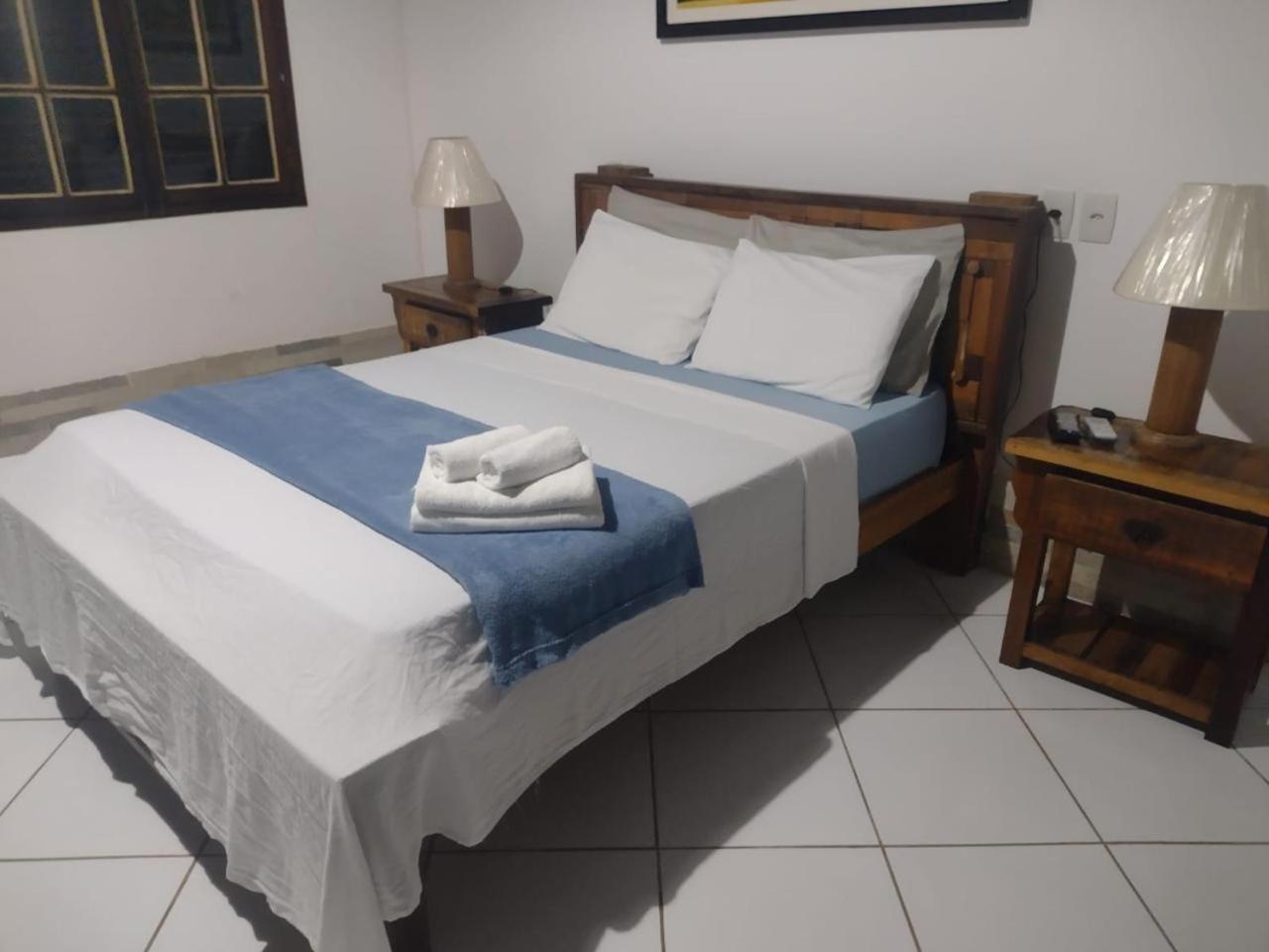 Quarto Quádruplo com Vista do Mar.