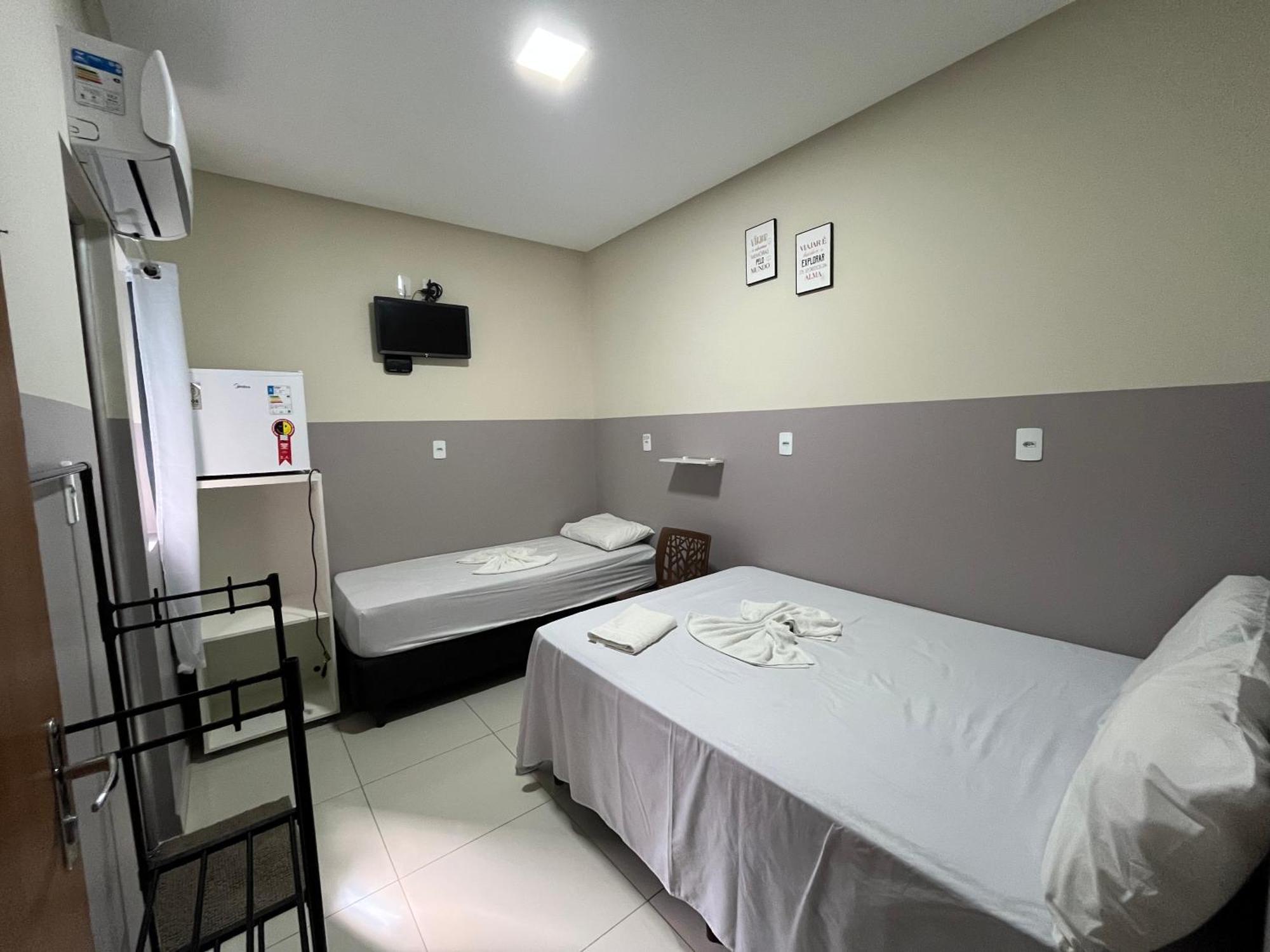 Quarto Triplo com Banheiro