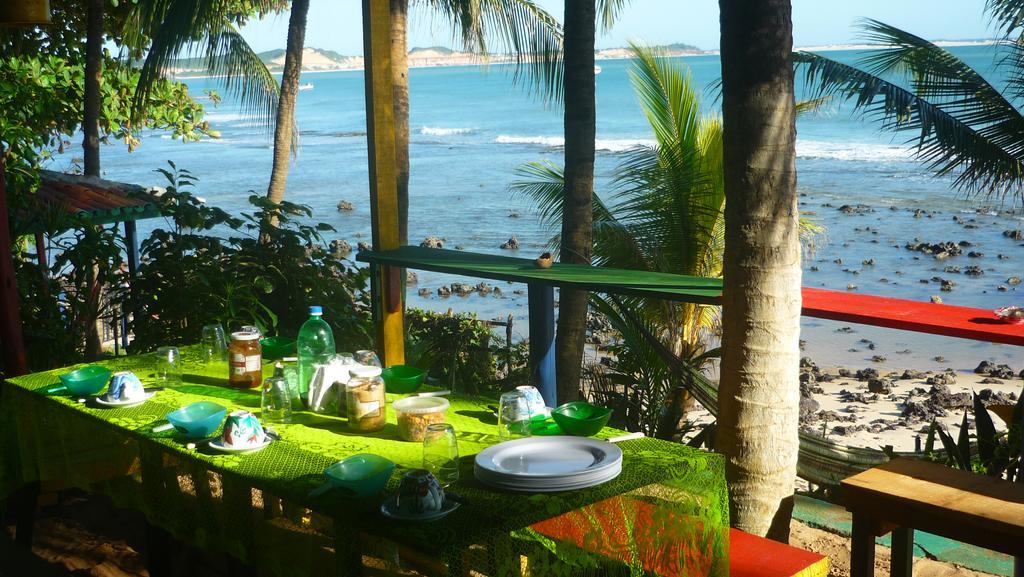 Quarto Quádruplo com Vista do Mar.