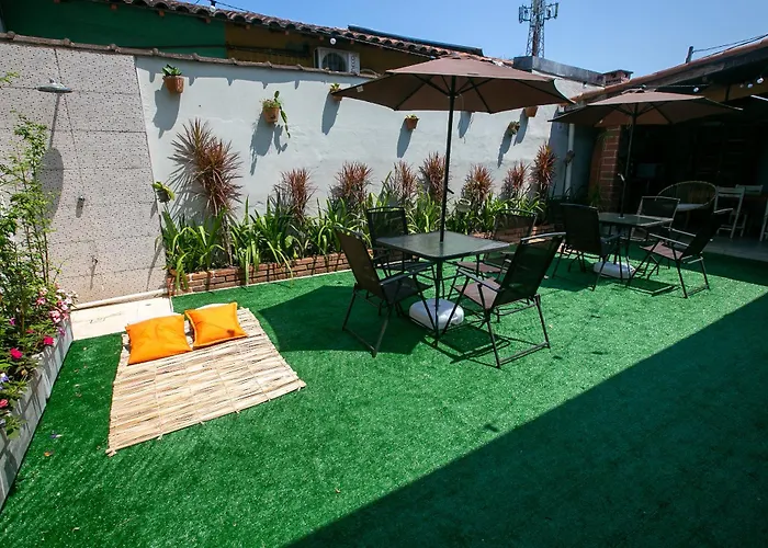 Juuquehy Surf House - suítes privativas-Passeio de canoa havaiana incluído Juquei